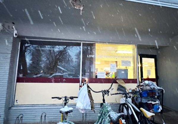 Exterior of the Loveland Resource Center as snow falls in the frame.
